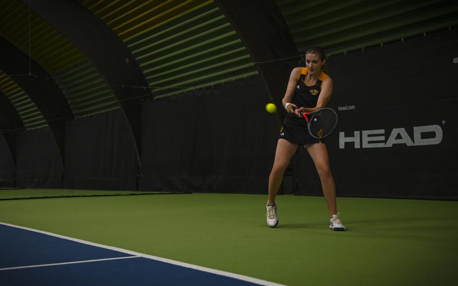 Stuttgart's Isabel Williams takes a powerful swing against her opponent, Vicenza's Delia Gordon, during the DODEA European tennis championships at T2 Sports Health Club in Wiesbaden, Germany, on Oct. 21, 2023. Williams contended with a hand injury and ultimately  fell to Gordon in the third place match.