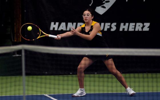 Stuttgart's Bella Farias reaches out to hit the ball during a girls singles match against Ansbach's Meredith Maxwell during the first day of the DODEA European tennis championships on Oct. 24, 2024, at T2 Sports Health Club in Wiesbaden, Germany.