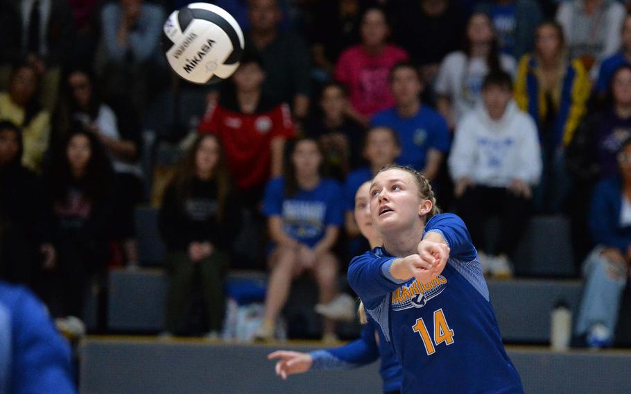 Wiesbaden’s Elizabeth Troxel hits the ball back over the net in the Division I final at the DODEA-Europe volleyball championships in Ramstein, Germany, Oct. 28, 2023. The Warriors took the Division I title with a 25-18, 12-25, 25-16, 22-25,15-13 win over the Ramstein Royals.