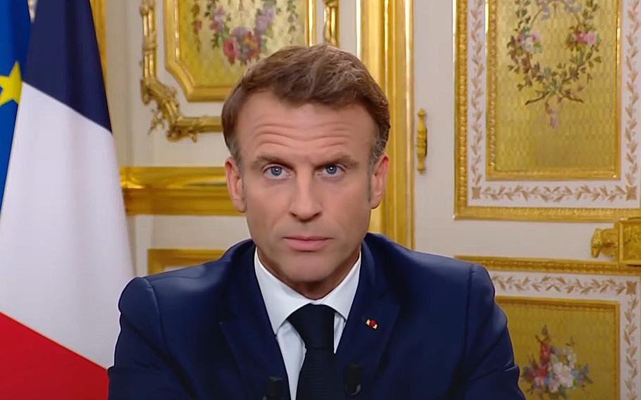 A video screen grab shows French President Emmanuel Macron urging the populace not to give in to any form of hatred.