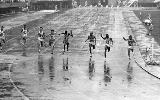 Tokyo, Japan, Oct. 14, 1964:  U.S. team member and Army Sgt. Mel Pender (right) wins his qualifying heat in the men’s 100-meter sprint. Due to an injury sustained off-track, Pender would finish sixth in the final, collapsing from pain from the torn muscle in his side after crossing the finish line. 

Pender would go on to win Olympic gold at the 1968 Olympics in Mexico City. Although he again finished sixth in the 100m, he won gold in 4×100m relay with Charlie Greene, Ronnie Ray and Jim Hines. Together they set a new world record of 38.24 seconds. 

He would go on to serve with distinction in the Army. Having enlisted in 1954 at age 17 he served the first 11 years with the 82nd Airborne Division, before graduating from Officer Candidate School in 1965. Sent to Vietnam for several tours, was awarded a Bronze Star and eventually became the head track coach at the U.S. Military Academy at West Point, before retiring from service in 1976 at the rank of Captain.

Looking for more of Stars and Stripes' historic Olympic coverage as you hype yourself up for this year's Paris Games? Subscribe to Stars and Stripes’ historic newspaper archive! We have digitized our 1948-1999 European and Pacific editions, as well as several of our WWII editions and made them available online through https://starsandstripes.newspaperarchive.com/

Tokyo Olympics; 1964 Summer Olympics; Games of the XVIII Olympiad; athletics; track and field; Team USA; athlete; sports; African American