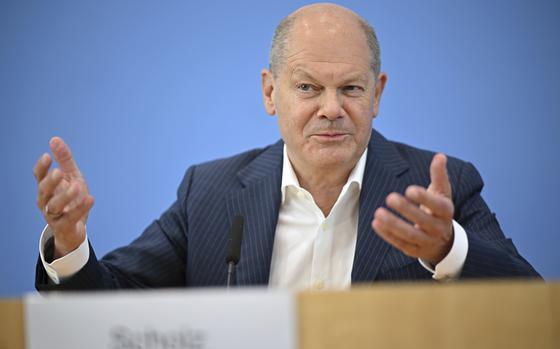 German Chancellor Olaf Scholz addresses the media during his summer press conference in Berlin, Germany, Wednesday, July 24, 2024. (Britta Pedersen/dpa via AP)