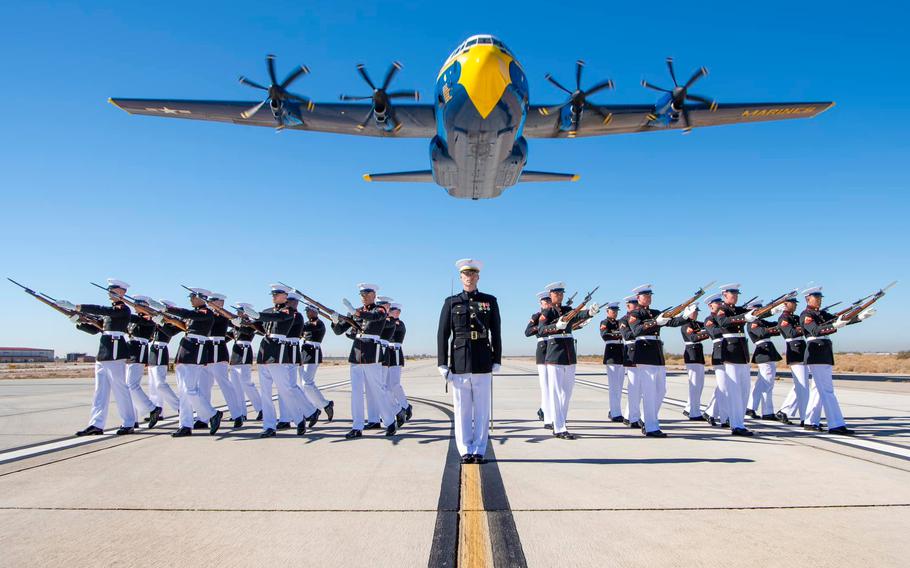 U.S. Marines with the Silent Drill Platoon execute a drill sequence