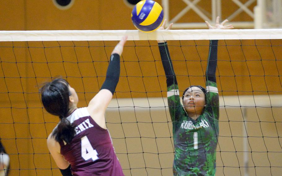 Kubasaki's Nevaeh Gilbert tries to block Seisen International's Yuna Lee during Thursday's American School In Japan YUJO tournament match. The Dragons won the rematch of last year's final in three sets.