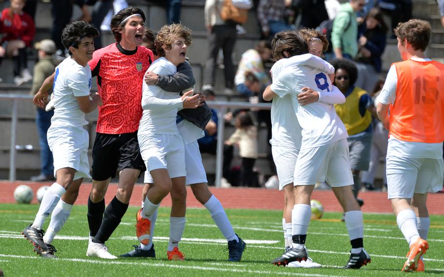 The Sigonella Jaguars celebrate after defeating Ansbach 4-1 in the Division III boys final at the DODEA-Europe soccer championships in Ramstein, Germany, May 18, 2023.