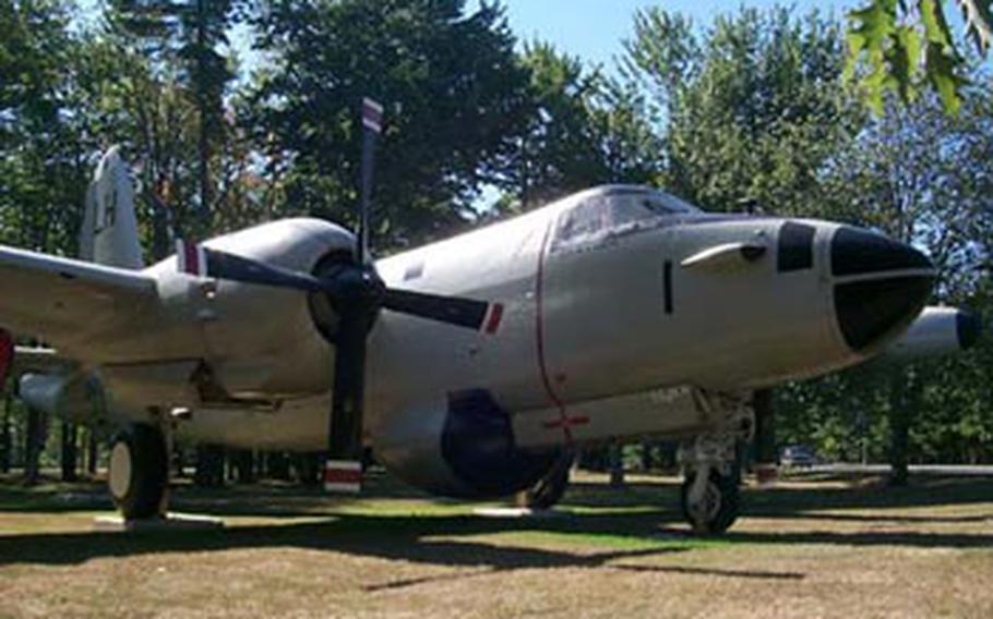 An old, twin-engine P2-Neptune airplane has sat beside the access road to the former Brunswick Naval Air Station since 1970. Out of time and out of place, the corroding Cold War-era relic has stayed put for more than 50 years while the world changed around it.