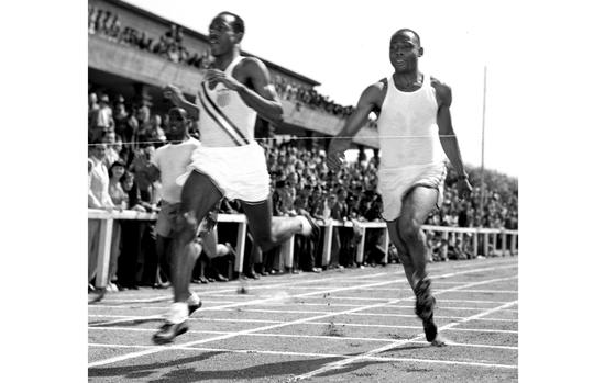 Frankfurt, Germany, August 21, 1948: In a repeat of their close finish at the recent Olympic Games in London, Harrison Dillard edges American teammate Barney Ewell in the 100-meter dash at a Frankfurt Athletic Club-sponsored exhibition meet featuring 10 Olympic athletes. Dillard won two gold medals at London and two more at Helsinki in 1952; he is still the only male ever to win Olympic titles in both the sprints and his specialty, the hurdles. Ewell won a gold in the relay and was runner-up in the 100 and 200 at London.

Looking for Stars and Stripes’ historic coverage? Subscribe to Stars and Stripes’ historic newspaper archive! We have digitized our 1948-1999 European and Pacific editions, as well as several of our WWII editions and made them available online through https://starsandstripes.newspaperarchive.com/

META TAGS: Olympics; Olympic Games; athletes; track and field; 