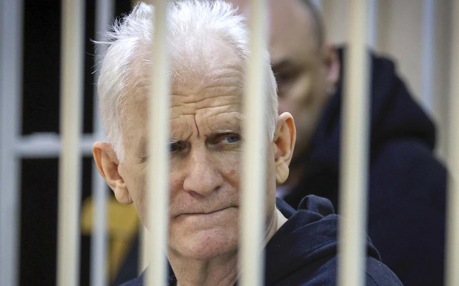 Head of the Viasna human rights group caged at a court session in Belarus, on Jan. 5, 2023.