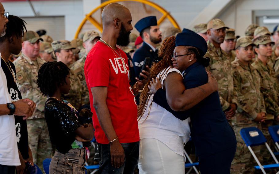 Senior Airman Ayanna Dickerson embraces Senior Airman Roger Fortson’s mother after singing the national anthem during a memorial service at Hurlburt Field, Fla., May 20, 2024. 