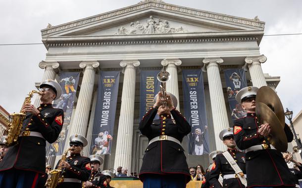 The Marine Forces Reserve Band performs in front of Gallier Hall during the Super Bowl LIX parade, New Orleans, Feb. 8, 2025. The Marine Corps is the lead service for Super Bowl LIX, participating in multiple events throughout the week exhibiting pride leading up to the U.S. Marine Corps’ 250th birthday. (U.S. Marine Corps photo by Sgt. Scott Jenkins)