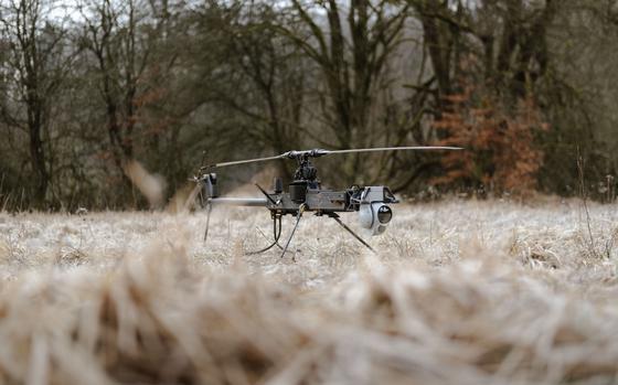 A U.S. Army Ghost reconnaissance drone sits in a field