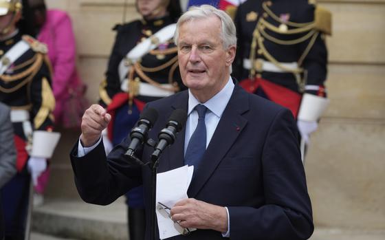 New French prime minister Michel Barnier delivers a speech during the handover ceremony, Thursday, Sept. 5, 2024 in Paris. President Emmanuel Macron has named EU's Brexit negotiator Michel Barnier as France's new prime minister after more than 50 days of caretaker government. (AP Photo/Michel Euler)