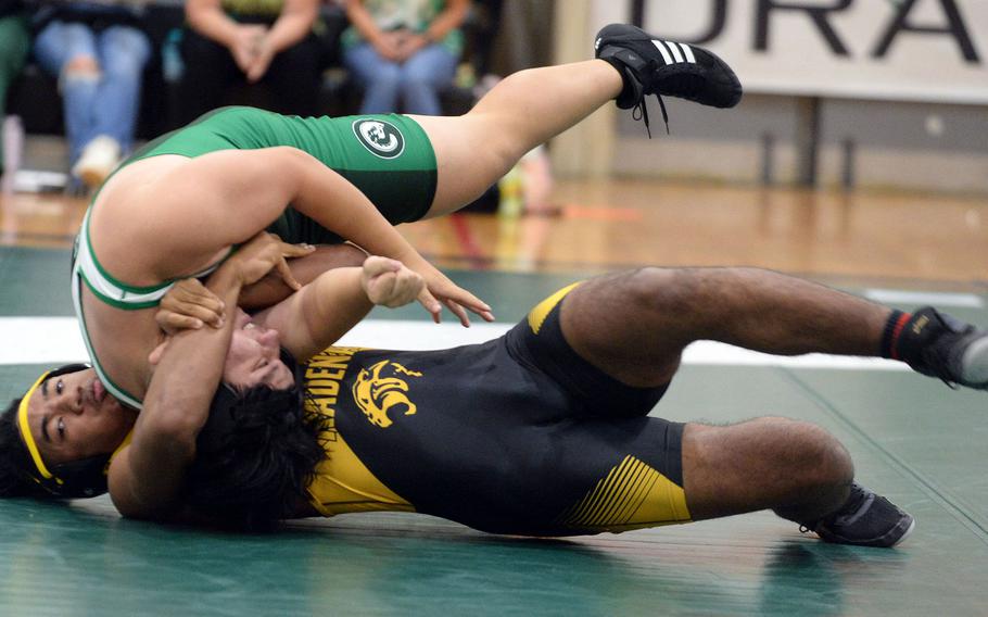 Kadena 189-pounder Tre Shears tilts Kubasaki's Erich Aquino during Wednesday's Okinawa wrestling dual meet. Shears won by techniical fall, 10-0 in 1 minute, 45 seconds, and the Panthers won the meet 35-26 to go 2--0 on the season.