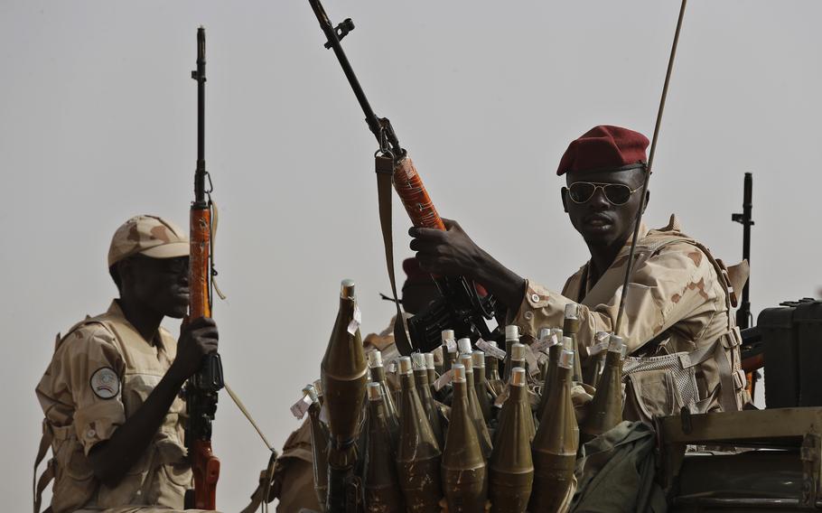 Sudan soldiers from the Rapid Support Forces unit, led by Gen. Mohammed Hamdan Dagalo, the deputy head of the military council, secure the area where Dagalo attends a military-backed tribe’s rally, in the East Nile province, Sudan, on June 22, 2019. 