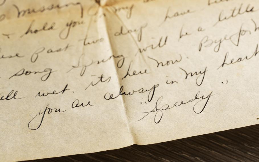 A letter from a GI to his wife says, at the end, “you are always in my heart.”