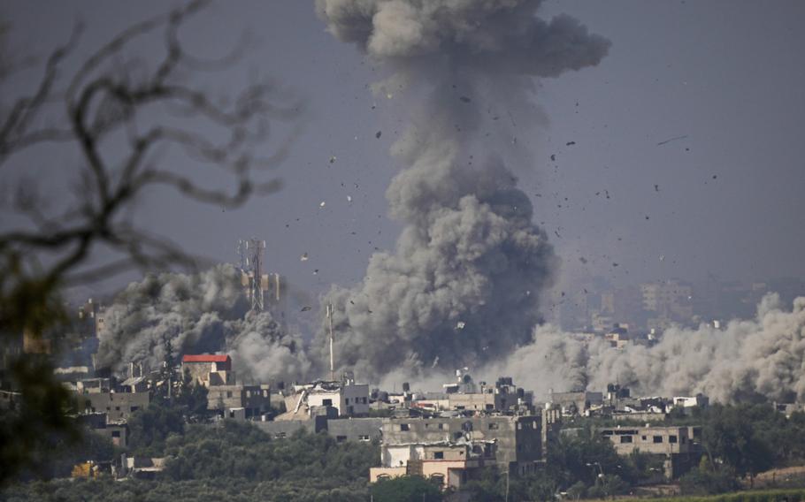 Smoke rises following an Israeli airstrike in the Gaza Strip, as seen from southern Israel, on Oct. 23, 2023. 