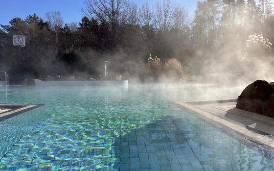 Steam rises from an outdoor pool at the Felsland Badeparadies in Dahn, Germany, on Jan. 14, 2025. The facility offers pools, water slides and saunas.
