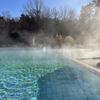 Steam rises from an outdoor pool at the Felsland Badeparadies in Dahn, Germany, on Jan. 14, 2025. The facility offers pools, water slides and saunas.
