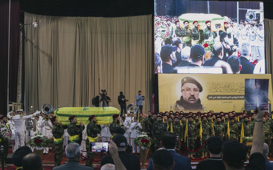 Mourners attend the funeral procession of Hezbollah commander Fuad Shukr, who was killed along with six other people including children in an Israeli airstrike in Beirut’s southern suburbs in July. 