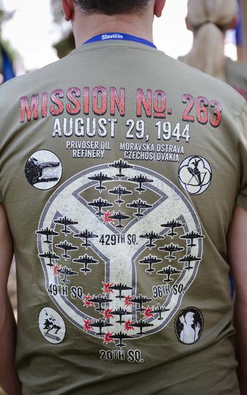 An American family member wears a T-shirt commemorating Mission 263, also known as the Battle over the White Carpathians, on Aug. 30, 2024, in during the 80th anniversary commemoration of the WWII battle in Nova Bosaca, Slovakia, Aug. 30, 2024. 