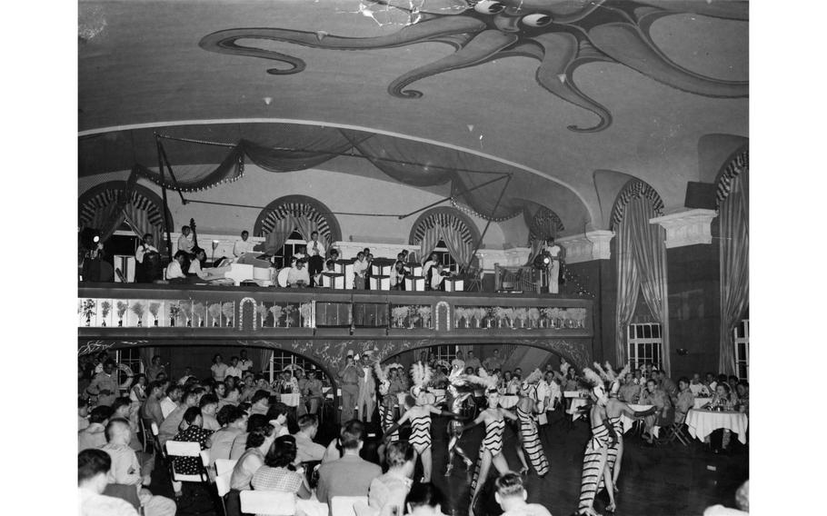 Service members and their dates enjoy the floor show in the Marine Room — one of two ballrooms at The Rocker Four nightclub in downtown Tokyo in September 1952. The Rocker Four Club opened its doors July 4, 1952, during the Korean War and in its six years of existence was the biggest — and to many the swingingest — all-ranks-and-NCO club in the world before closing its doors in March 1958.