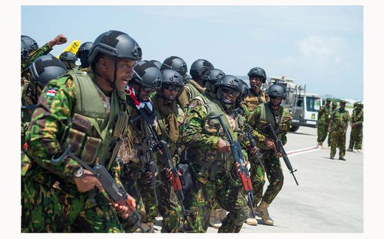 A second contingent of 200 police officers from Kenya arrive at Toussaint Louverture International Airport in Port-au-Prince, Haiti, July 16, 2024. Another 200 police officers arrived Haiti under a UN-backed mission to try to quell rampant gang violence. The deployment comes after Kenya sent some 400 officers to Port-au-Prince in June, part of a controversial offer to send some 1,000 police to help stabilize the country. (Clarens Siffroy/AFP via Getty Images/TNS)