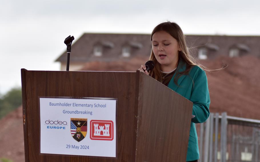 Arleigh Smith, a fifth grader at Smith Elementary School in Baumholder, Germany, speaks at a ceremony Wednesday, May 29, 2024, to commemorate the start of construction of a new elementary school for up to 700 students at the U.S. Army base in Baumholder.