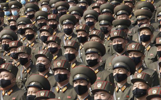 FILE - Soldiers wearing face masks to help curb the spread of the coronavirus rally to welcome the 8th Congress of the Workers' Party of Korea at Kim Il Sung Square in Pyongyang, North Korea, on Oct. 12, 2020. (AP Photo/Jon Chol Jin, File)