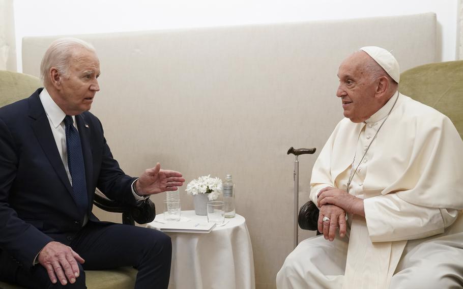 President Joe Biden, left, meets with Pope Francis in Savelletri, Puglia, Italy, June 14, 2024. 