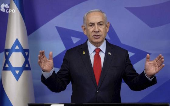 In this screen grab image from video provide by the Israeli Government Press Office, Israeli Prime Minister Benjamin Netanyahu makes a televised statement Tuesday, Nov. 26, 2024, in Jerusalem, Israel. (Israeli Government Press Office via AP)