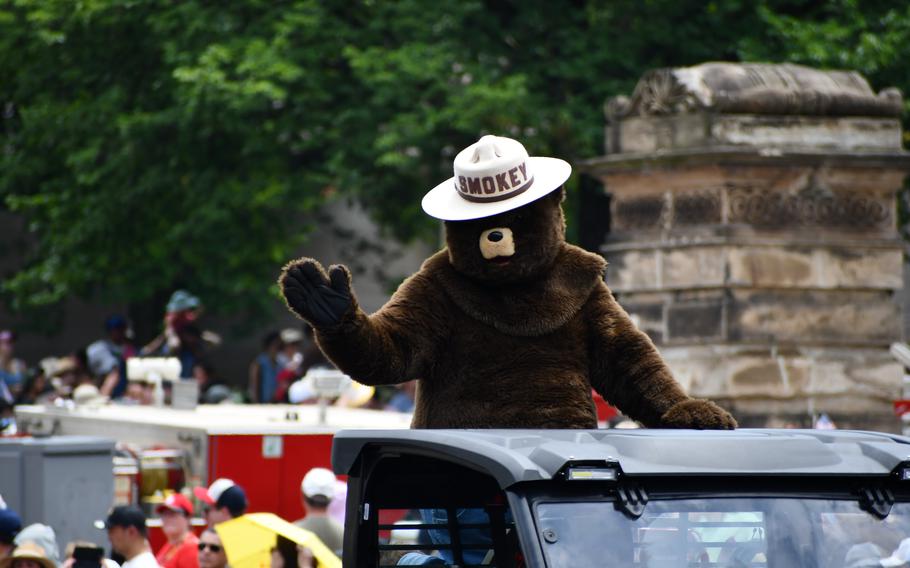 Smokey the Bear, mascot of the National Parks Service, waves to onlookers at the Independence Day Parade on July 4, 2024, in Washington, D.C.