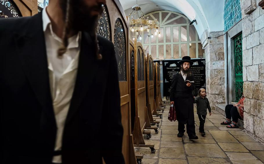 Worshipers read scripture inside the Cave of the Patriarchs in Hebron in the occupied West Bank.