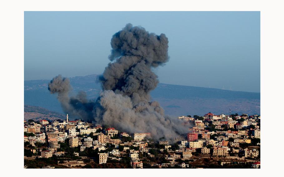 Smoke billows following an Israeli air strike that targeted a house in the southern Lebanese village of Khiam near the Lebanese-Israeli border on June 21, 2024, amid ongoing cross-border clashes between Israeli troops and Hezbollah fighters. 