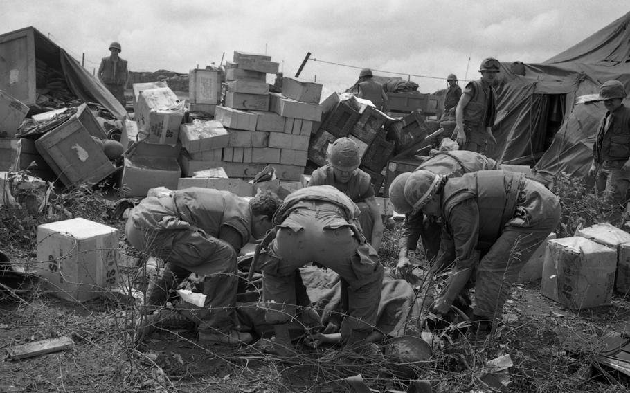 Marines retrieve the body of a Marine