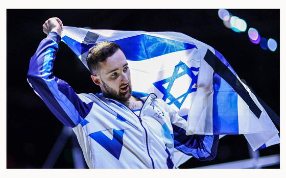 Gold medalist Artem Dolgopyat of Team Israel celebrates after winning the Men's Floor Exercise Final on Day Eight of the 2023 Artistic Gymnastics World Championships at Antwerp Sportpaleis on Oct. 7, 2023, in Antwerp, Belgium. (Naomi Baker/Getty Images/TNS)