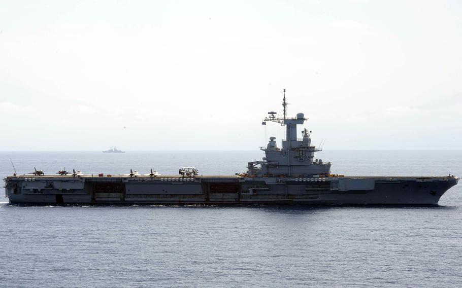 The aircraft carrier FS Charles De Gaulle steams in the Mediterranean Sea.