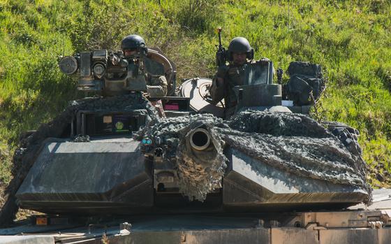 M1 Abrams tanks assigned to 1st Armored Brigade Combat Team, 3rd Infantry Division conduct vehicle movements at Hohenfels Training Area, Germany in 2022. The unit is returning to Europe to replace the 1st Cavalry Division's 1st ABCT, as part of a regular rotation of forces to the Continent.  