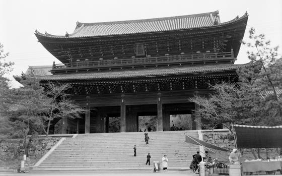The Sanmon Gate at the Chion-in temple complex in Kyoto, as it was in March 1955. The 16th century gate measures over 24 meters (78 feet) and was photographed by Stars and Stripes photographer Neil E. Callahan. Callahan shot several street scenes and buildings in and around Kyoto. Seven of these negatives survived and were found in Stars and Stripes' archives in 2024 and subsequently digitized.