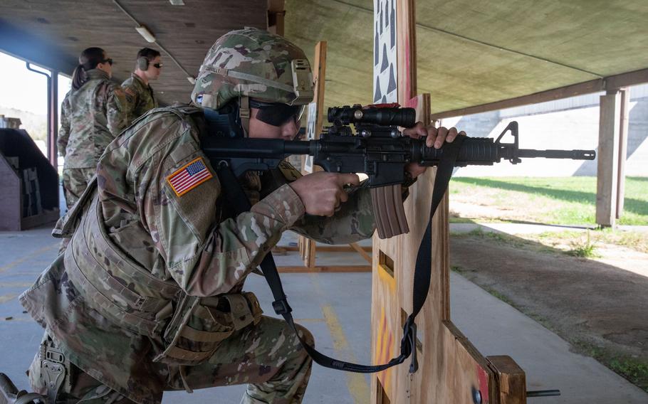 U.S. Army Spc. Brandon Lu shoots an M4A1 carbine during the weapons qualification event of the 2024 Georgia Army National Guard State Best Warrior Competition at the Catoosa Volunteer Training Site, Ringgold, Ga., March 13, 2024. 