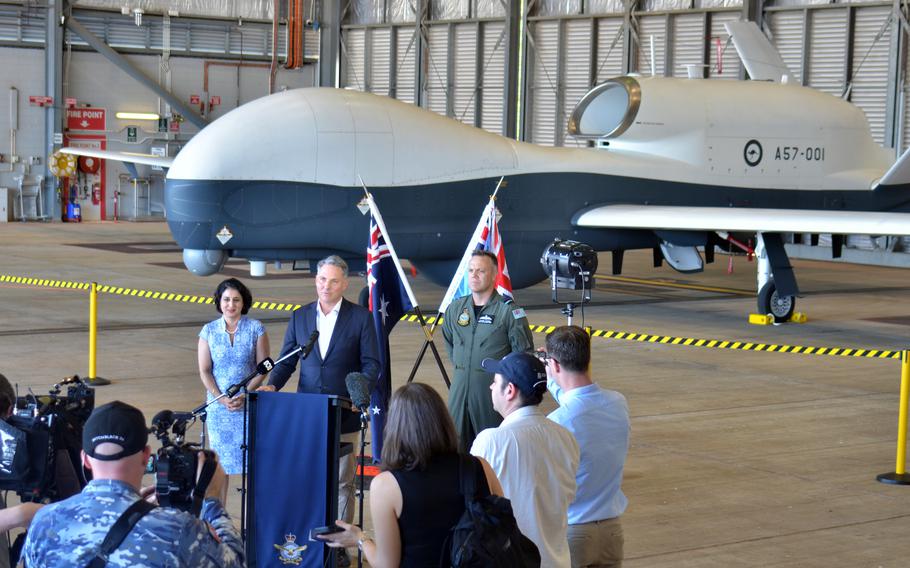 Australian Deputy Prime Minister Richard Marles, flanked by Northrop Grumman Australia chief executive Christine Zeitz and the head of nation's air force, Air Marshal Stephen Chappell, speaks about new MQ-4C Tritons at Royal Australian Air Force Base Tindal, Wednesday, July 31, 2024.