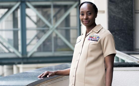 Command Master Chief Samira McBride wears the maternity Navy service ...