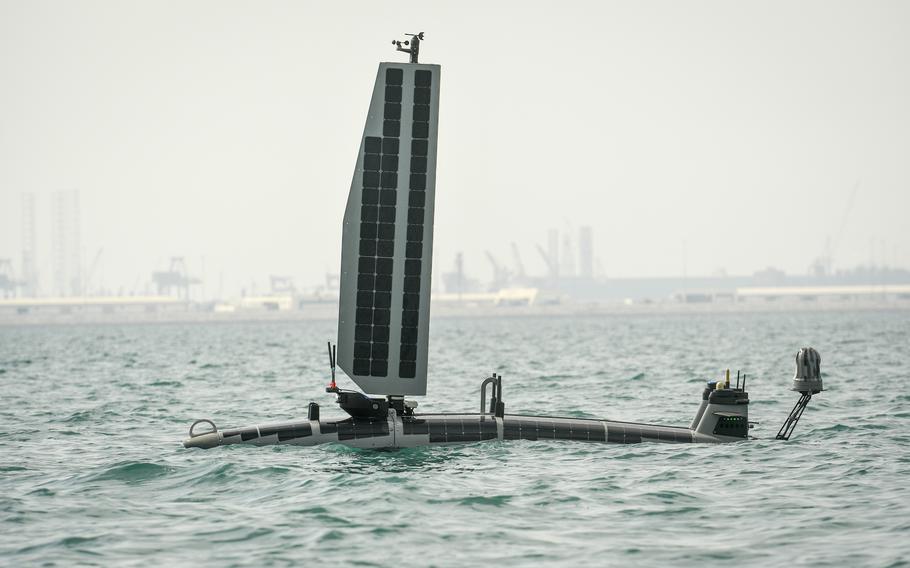 The unmanned vessel Ocean Aero Triton cruises through international waters between Naval Support Activity Bahrain and Iran on Nov. 30, 2022, as part of a naval exercise. The U.S. Navy's goal of having a fleet of 100 unmanned surface vessels in the Middle East remains unfulfilled.