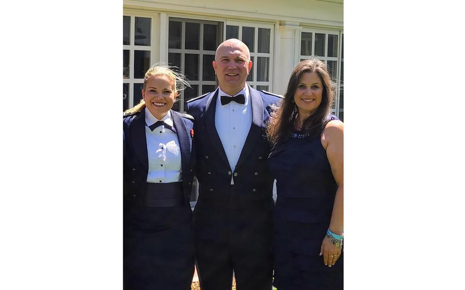 Cailin Foster with her parents Gary and Colleen Foster following a ceremony to commission her as a second lieutenant in the Air Force in 2021.