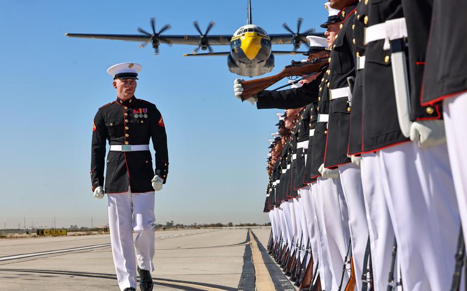 U.S. Marines with the Silent Drill Platoon execute a drill sequence