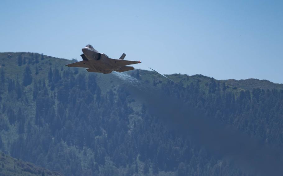 U.S. Air Force Maj. Kristin “BEO” Wolfe, F-35A Lightning II Demonstration Team commander, flies an F-35 assigned to the 421st Fighter Generation Squadron during a practice performance at Hill Air Force Base, Utah, July 12, 2023. Military members and key spouses with the 388th Fighter Wing were invited to observe the practice performance on the flight line and interact with the crew members assigned to the demonstration team. 