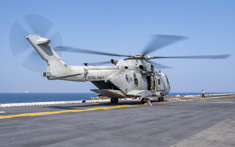 A Royal Navy Merlin MK4 on the flight deck of the amphibious assault ship USS Essex in the Gulf of Oman in 2021. A member of the Royal Navy was killed when a Merlin MK4 helicopter ditched in the English Channel during a nighttime training exercise, the U.K. defense ministry said Thursday, Sept. 5, 2024.