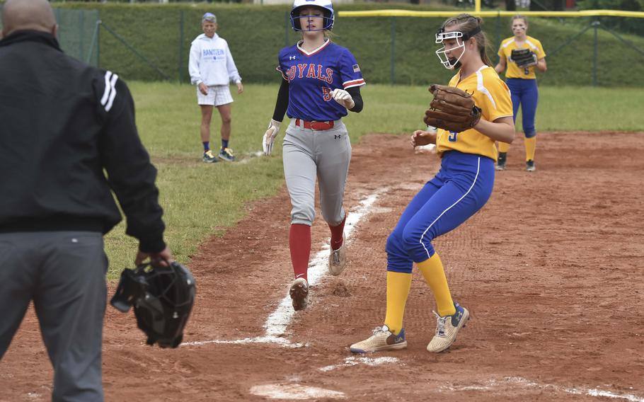 Ramstein junior Charlotte Rhyne runs home for a score during the DODEA-Europe softball championship semifinal May 23, 2024, on Ramstein Air Base, Germany. Ramstein won the game against Wiesbaden 15-3.