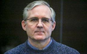 FILE - Paul Whelan, a former U.S. Marine accused of espionage, listens to the verdict in a courtroom in Moscow, Russia, June 15, 2020. Arrests of Americans in Russia have become increasingly common as relations between Moscow and Washington sink to Cold War lows. Some have been exchanged for Russians held in the U.S., while for others, the prospects of being released in a swap are less clear. (Sofia Sandurskaya, Moscow News Agency photo via AP, File)