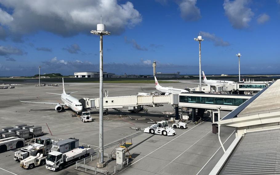 Airplanes are parked at Naha Airport on Okinawa.