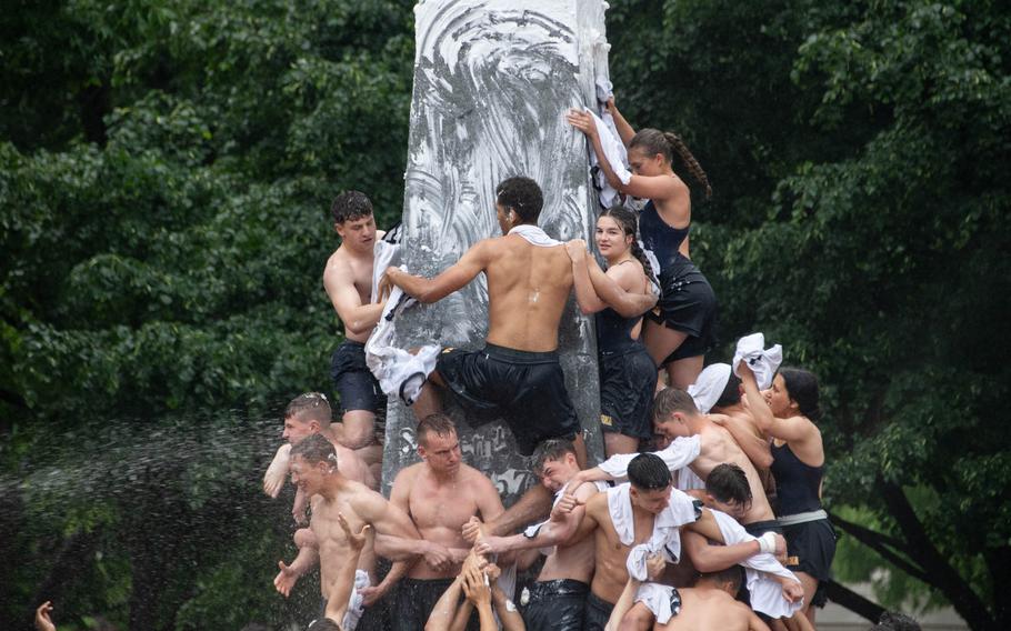 U.S. Naval Academy freshmen, or plebes, climb the Herndon monument, a tradition symbolizing the successful completion of the midshipmen’s freshman year. The class of 2027 completed the climb in 2 hours, 19 minutes and 11 seconds.